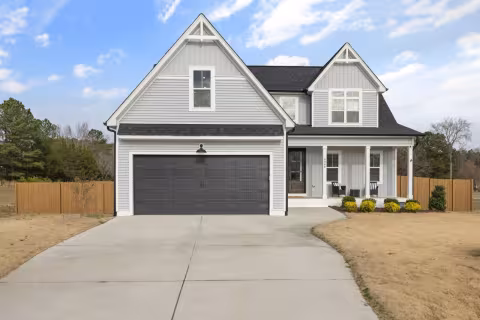Modern garage door freshly painted for a pre-sale Oakville home |