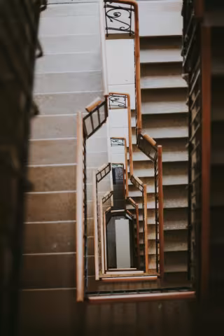Wood newel post and handrail upgrade on a Greater Toronto Area staircase
