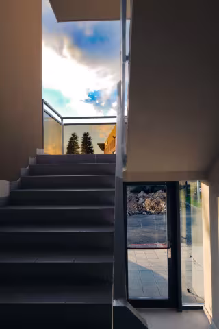 ustom modern stair railing installation in an Oakville home