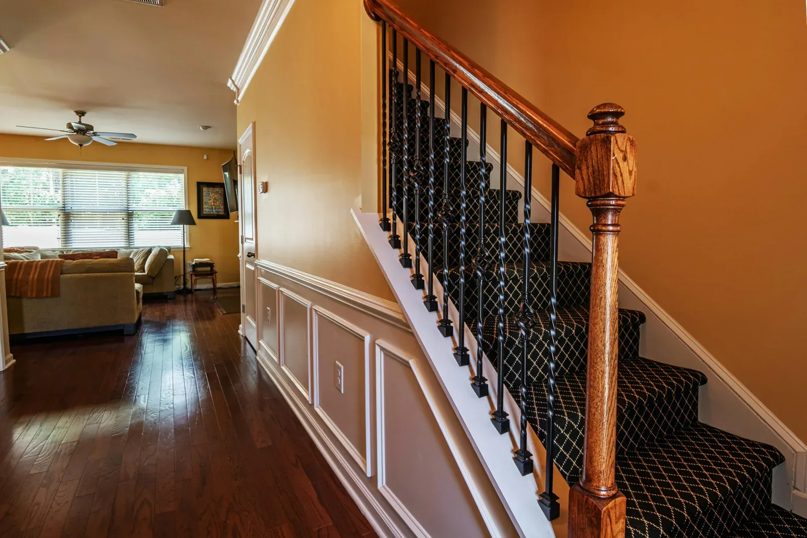 Staircase refinishing completed by AC Brothers in Mississauga — hardwood stairs sanded and restained dark walnut